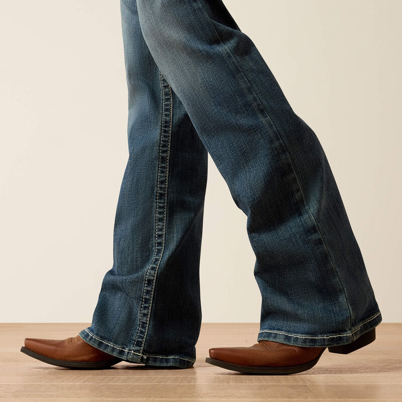 R.E.A.L. Mid Rise Stretch Whipstitch Boot Cut Jean