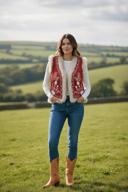 Ärmlös stickad väst