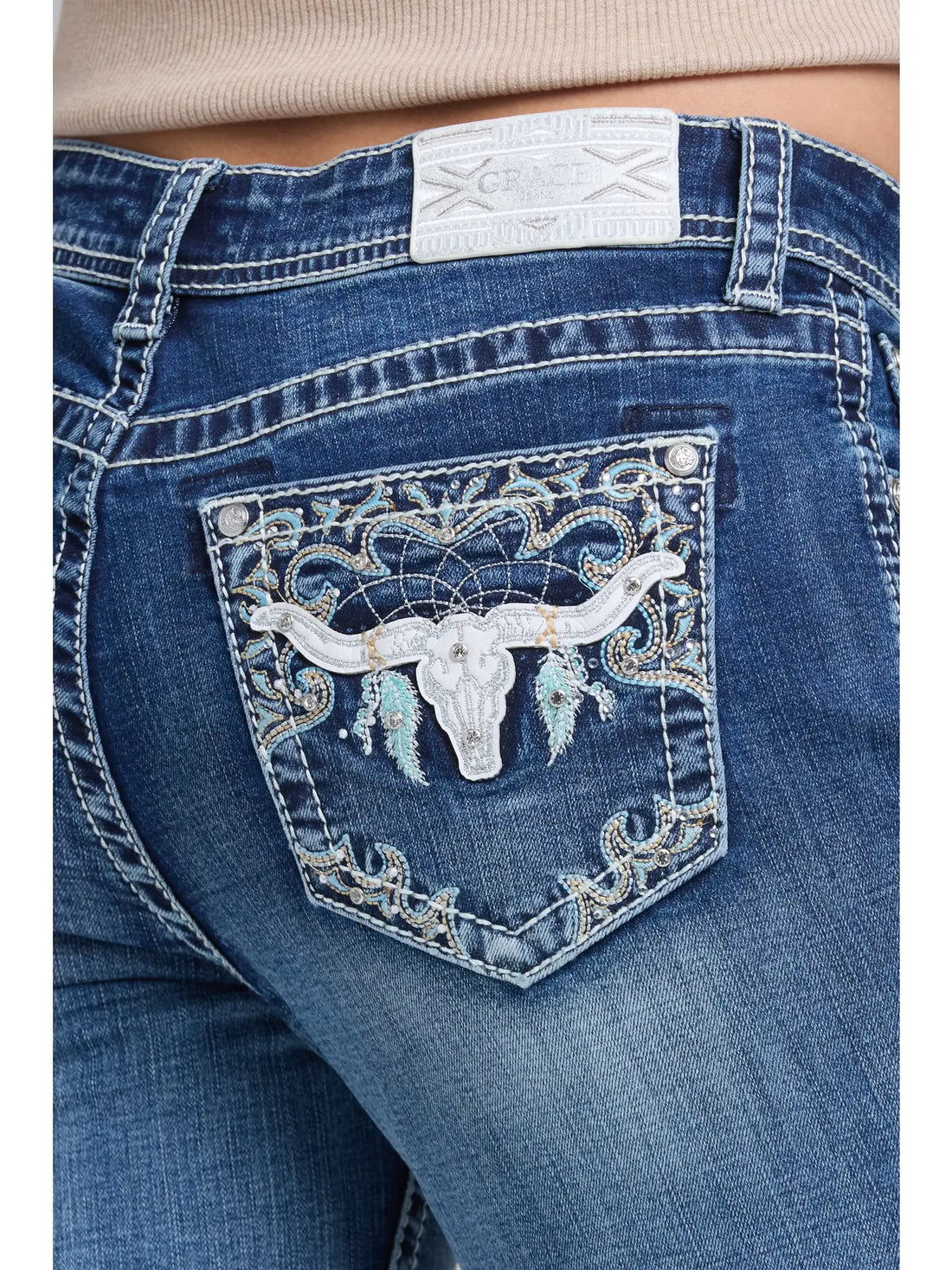Tjurhuvudbroderi, normalhög midja, bootcut 32"
